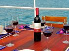 Giamani Similan Island Liveaboard table set up with wine